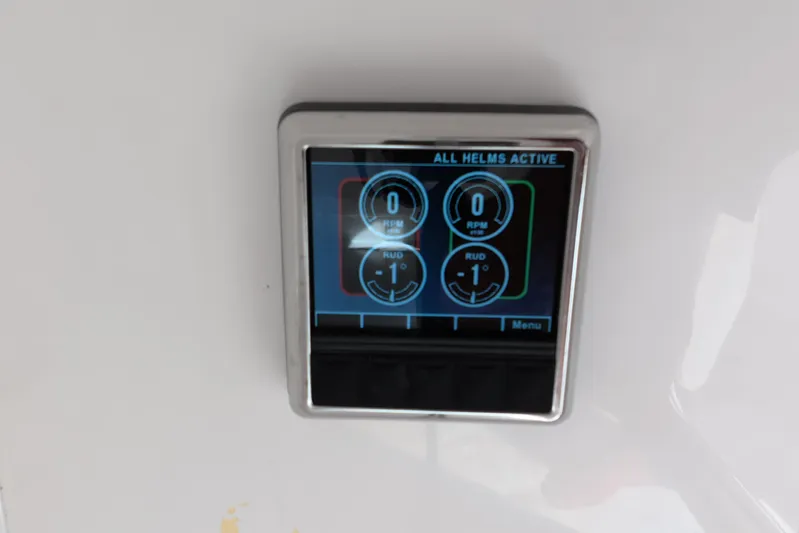  Yacht Photos Pics Digital display panel on 2023 Invincible 33 Catamaran, showing helm activity and rudder settings.