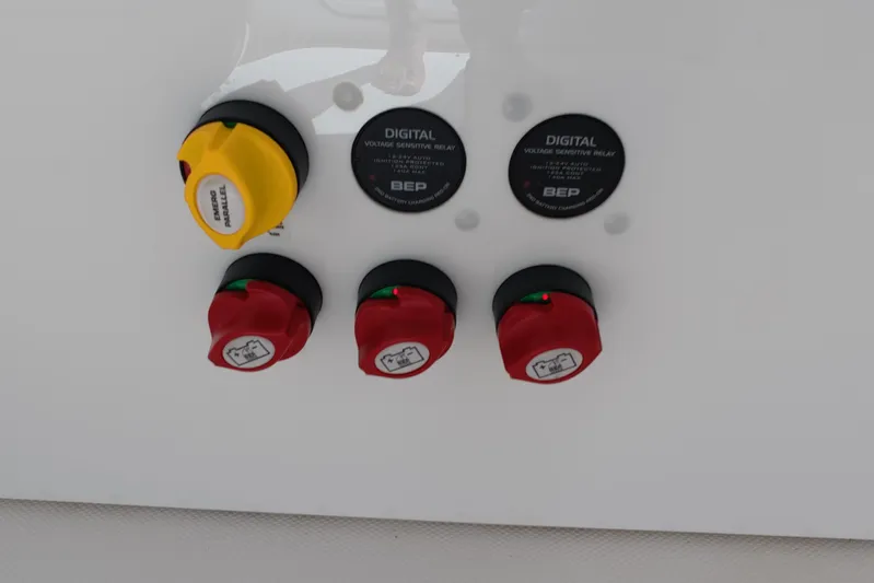  Yacht Photos Pics Control panel of 2023 Invincible 33 Catamaran with digital voltage relays and switches.