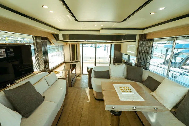  Yacht Photos Pics Luxurious interior of 2024 Absolute NAVETTA 52 yacht with modern seating and elegant design.