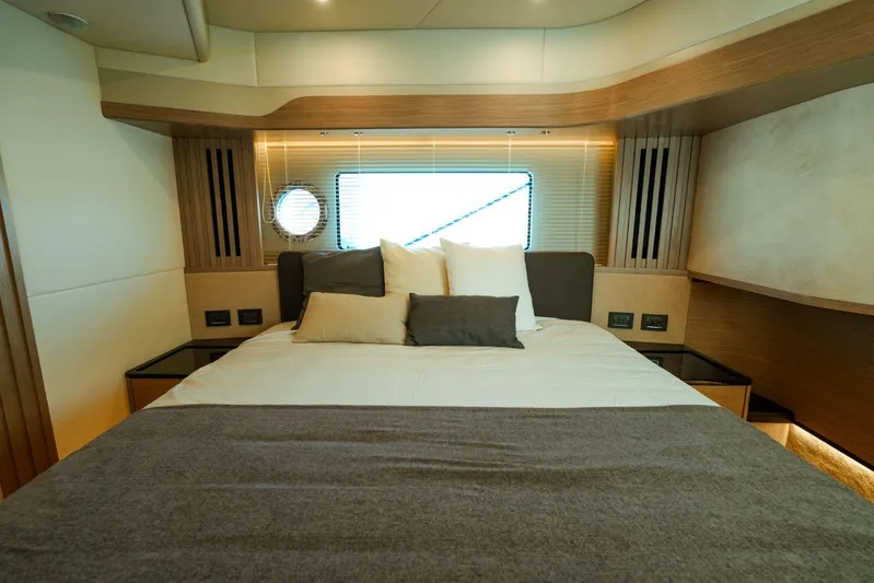  Yacht Photos Pics Luxurious bedroom interior of 2024 Absolute NAVETTA 52 yacht with modern design.
