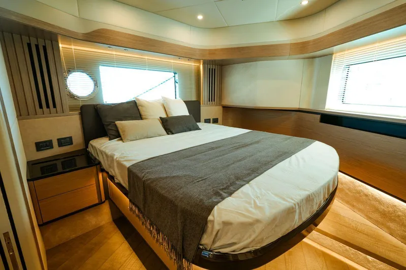  Yacht Photos Pics Luxurious bedroom interior of 2024 Absolute NAVETTA 52 yacht with modern design.