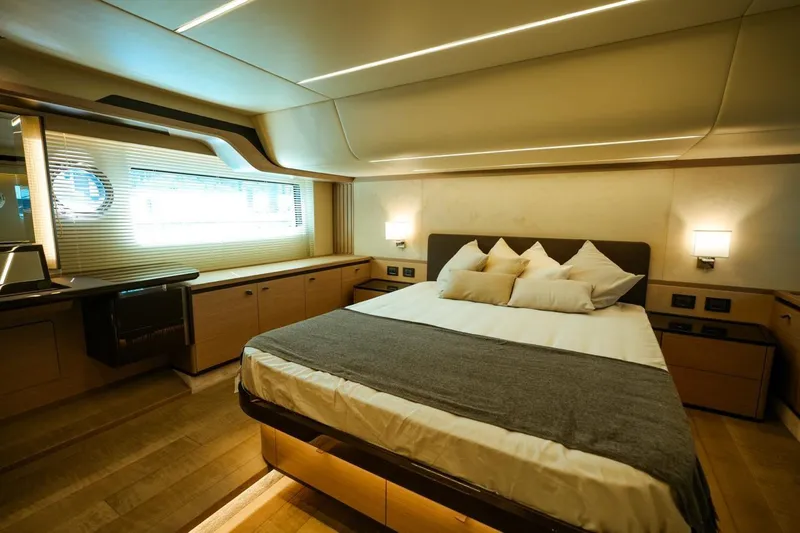  Yacht Photos Pics Luxurious bedroom interior of 2024 Absolute NAVETTA 52 yacht with modern design.