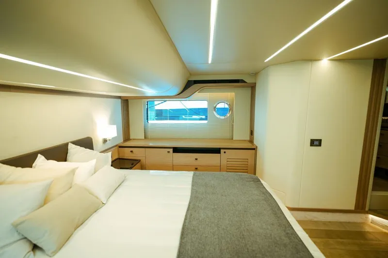  Yacht Photos Pics Luxurious bedroom interior of 2024 Absolute NAVETTA 52 yacht with modern design.