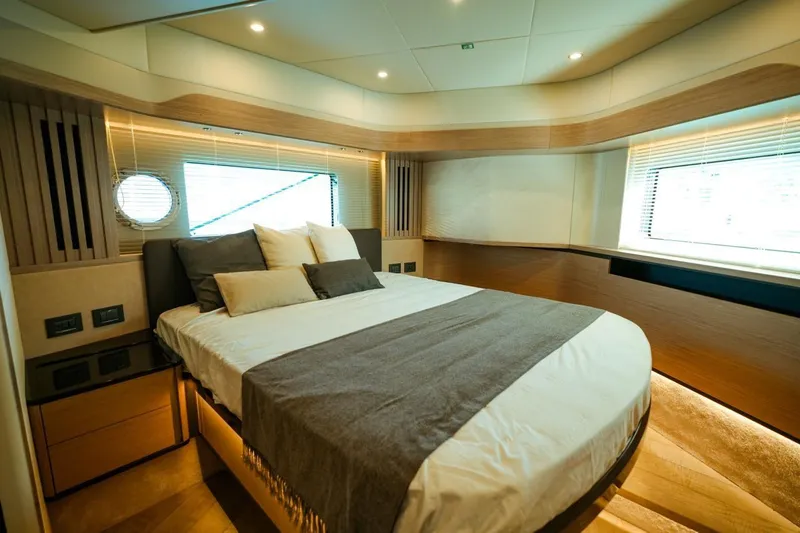  Yacht Photos Pics Luxurious bedroom interior of 2024 Absolute NAVETTA 52 yacht with modern design.