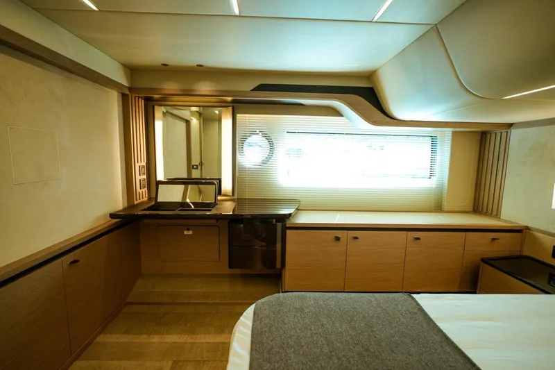  Yacht Photos Pics Luxurious interior of 2024 Absolute NAVETTA 52 yacht with modern design and ample natural light.