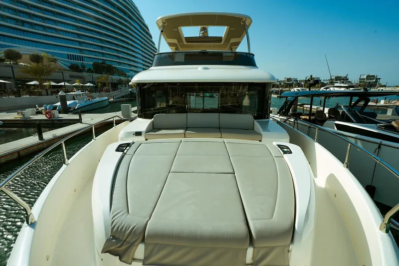  Yacht Photos Pics 2024 Absolute NAVETTA 52 yacht with spacious sun deck at marina.