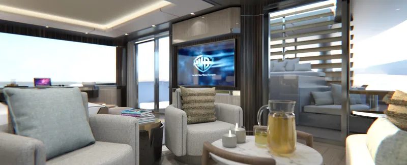 Spitfire Yacht Photos Pics Luxurious yacht interior with modern decor, featuring a TV, comfortable seating, and ocean views.
