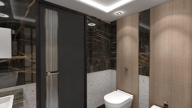 Spitfire Yacht Photos Pics Modern bathroom with sleek design, featuring marble walls and a contemporary toilet.