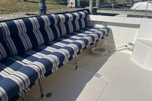  Yacht Photos Pics 2008 Back Cove 29 boat with striped seating in the deck area.