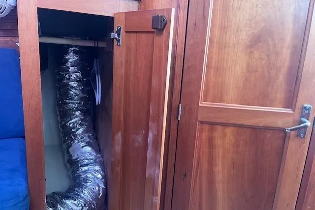 Yacht Photos Pics 2008 Back Cove 29 interior showing wooden cabinetry and exposed ductwork.