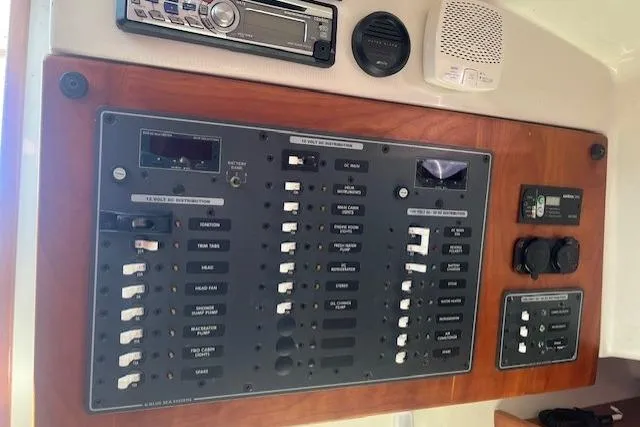  Yacht Photos Pics Electrical control panel on a 2008 Back Cove 29 boat, featuring switches and gauges.