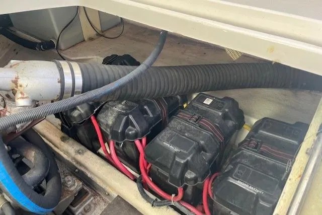  Yacht Photos Pics Battery compartment of a 2008 Back Cove 29 boat with wiring and hoses.