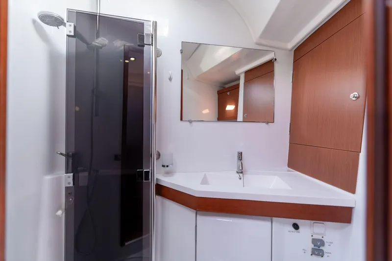 Resiliance Yacht Photos Pics Modern bathroom in 2013 Beneteau Oceanis 50 yacht with shower and sink.