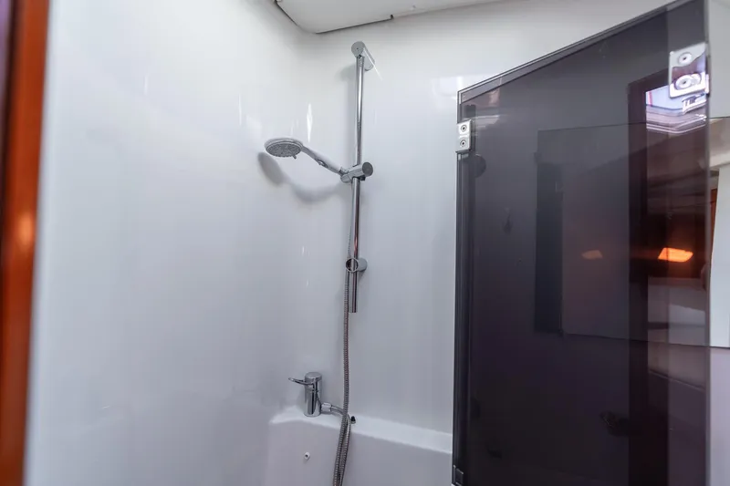 Resiliance Yacht Photos Pics Shower area in 2013 Beneteau Oceanis 50 yacht, featuring modern fixtures and sleek design.