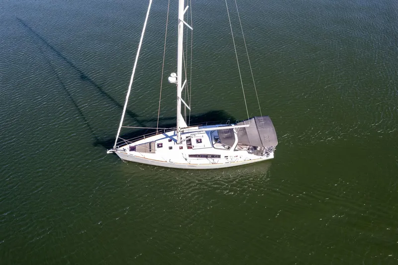 Resiliance Yacht Photos Pics Aerial view of 2013 Beneteau Oceanis 50 sailboat on calm water.