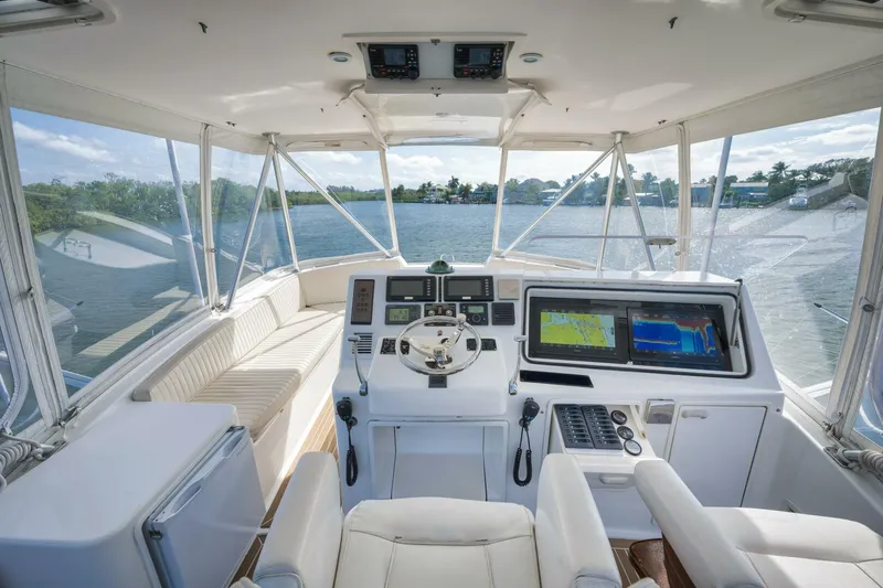 Mullet Yacht Photos Pics Interior view of 2006 Ocean Yachts 50 Super Sport cockpit with navigation equipment.