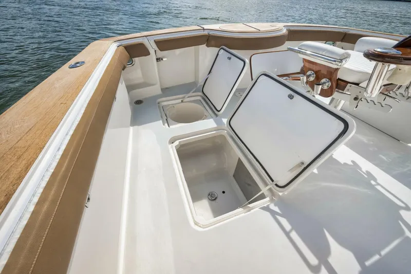 Mullet Yacht Photos Pics 2006 Ocean Yachts 50 Super Sport deck with open storage compartments.