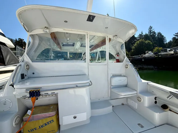  Yacht Photos Pics 2007 Glacier Bay 3480 Ocean Runner boat interior with seating and life jackets.