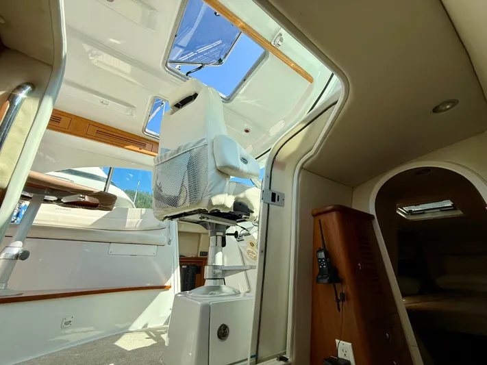  Yacht Photos Pics Interior of 2007 Glacier Bay 3480 Ocean Runner boat, featuring seating and cabin area.