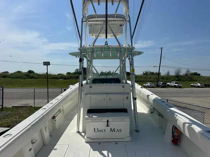  Yacht Photos Pics 2013 SeaVee 390B boat with tower, open deck, and "Uno Mas" cooler.