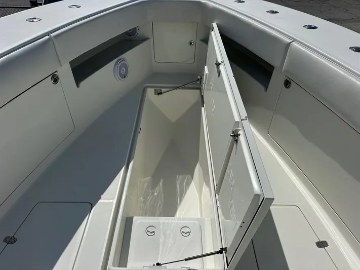  Yacht Photos Pics 2013 SeaVee 390B boat interior with open storage compartment.