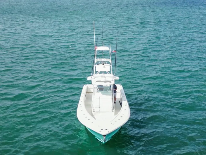 Yacht Photos Pics 2013 SeaVee 390B boat on clear blue water, aerial view.