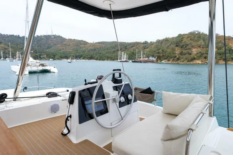 My Marina Yacht Photos Pics Sailing yacht Bali 4.8, 2020 model, with scenic coastal view and comfortable seating.