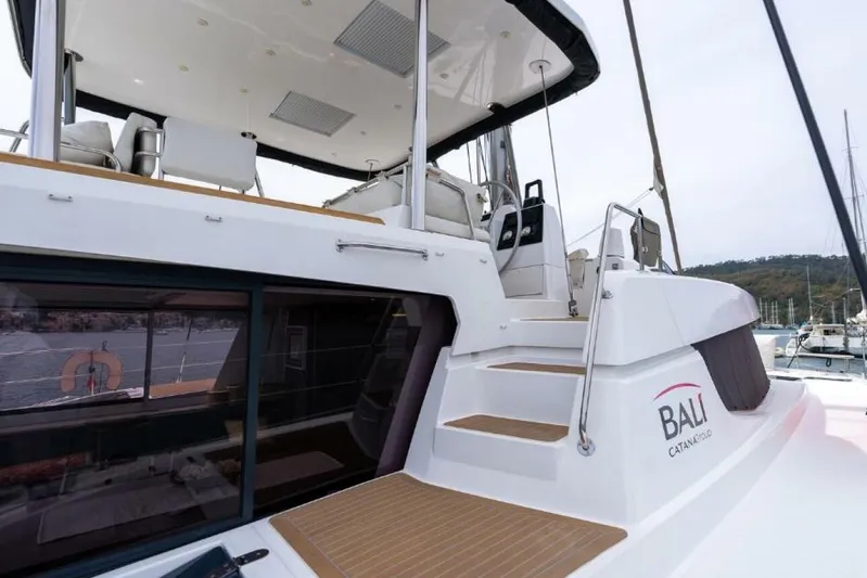 My Marina Yacht Photos Pics 2020 Bali 4.8 catamaran, featuring spacious deck and modern design in marina setting.