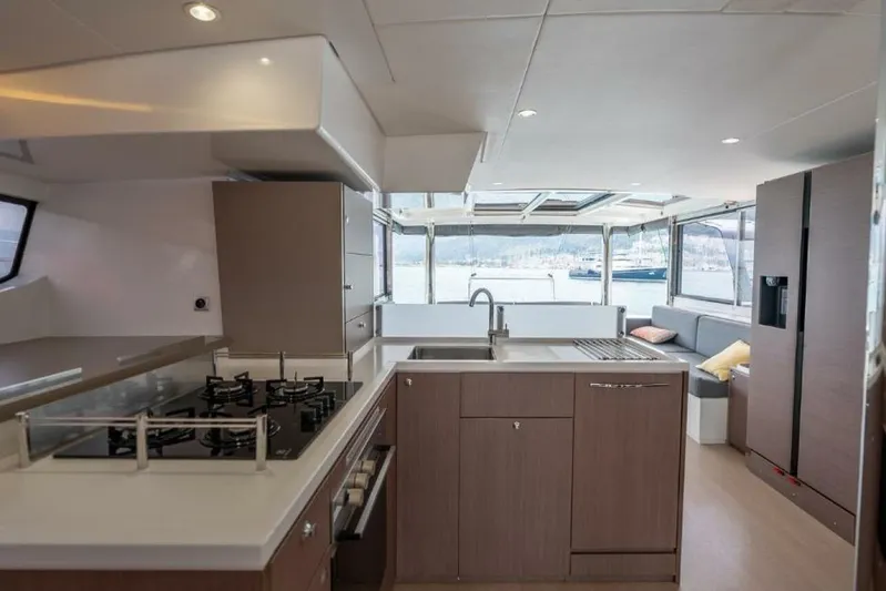 My Marina Yacht Photos Pics Modern kitchen interior on a 2020 Bali 4.8 yacht with sleek design and ocean view.