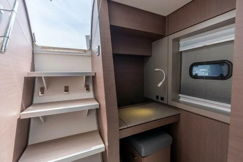 My Marina Yacht Photos Pics Interior of 2020 Bali 4.8 yacht with stairs and desk area.