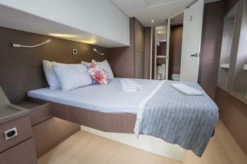 My Marina Yacht Photos Pics Luxurious cabin interior of 2020 Bali 4.8 yacht with cozy bed and modern design.