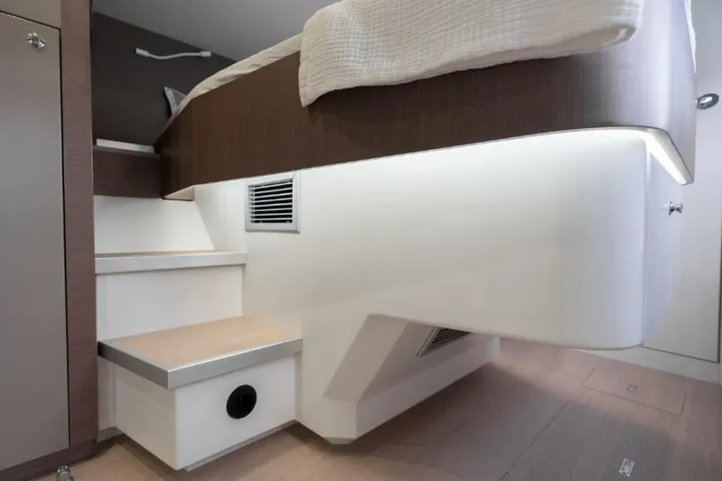 My Marina Yacht Photos Pics Interior of 2020 Bali 4.8 yacht featuring modern bed and storage steps.