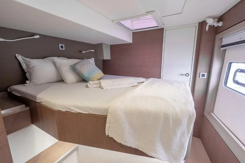 My Marina Yacht Photos Pics Luxurious cabin interior of 2020 Bali 4.8 yacht with cozy bed and modern design.