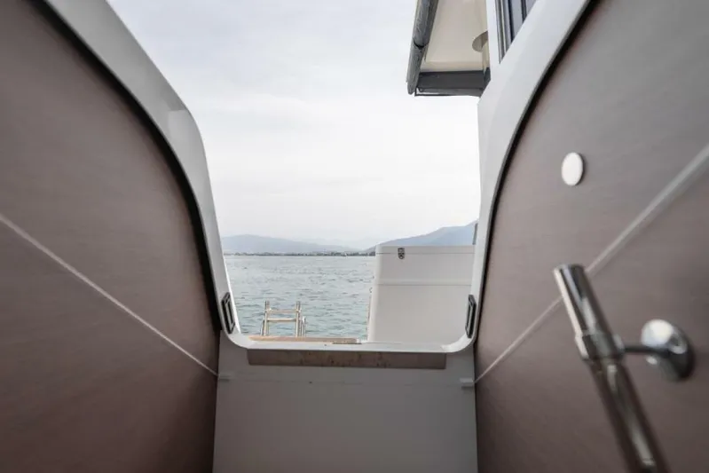 My Marina Yacht Photos Pics View from Bali 4.8 yacht, 2020 model, overlooking serene ocean and distant mountains.