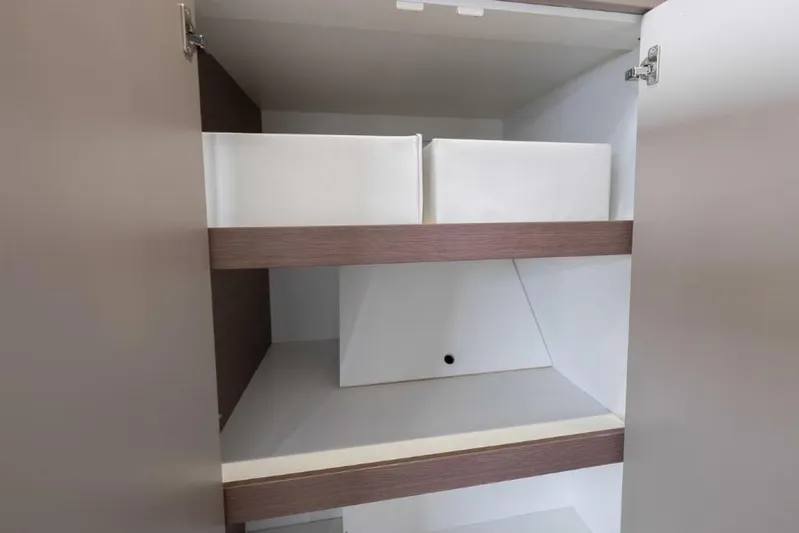 My Marina Yacht Photos Pics Open cabinet with shelves on a 2020 Bali 4.8 model.