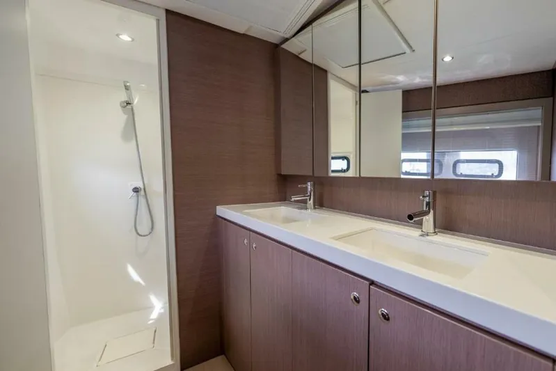 My Marina Yacht Photos Pics Modern yacht bathroom with dual sinks, shower, and wooden cabinetry, Bali 4.8 model, 2020.