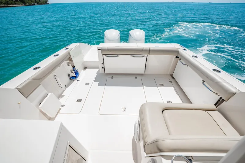 Waikiki Yacht Photos Pics 2017 Pursuit DC 325 Dual Console boat interior with spacious seating and ocean view.