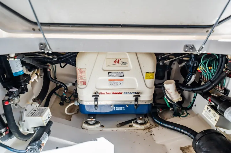 Waikiki Yacht Photos Pics Engine compartment of 2017 Pursuit DC 325 Dual Console with Fischer Panda generator.