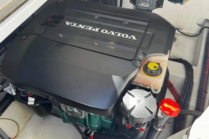  Yacht Photos Pics Volvo Penta engine in 2019 Jeanneau NC33 boat, showcasing detailed components.