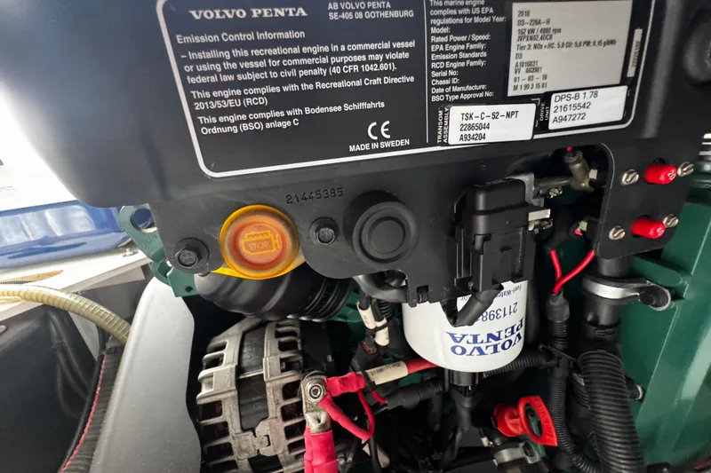  Yacht Photos Pics Volvo Penta engine in 2019 Jeanneau NC33 boat, showing emission control details.