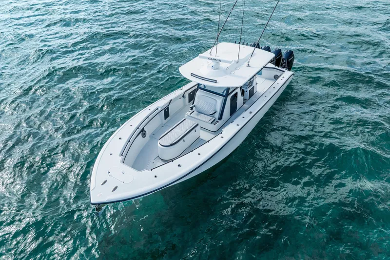  Yacht Photos Pics 2024 Yellowfin 39 Offshore boat on clear blue ocean waters.