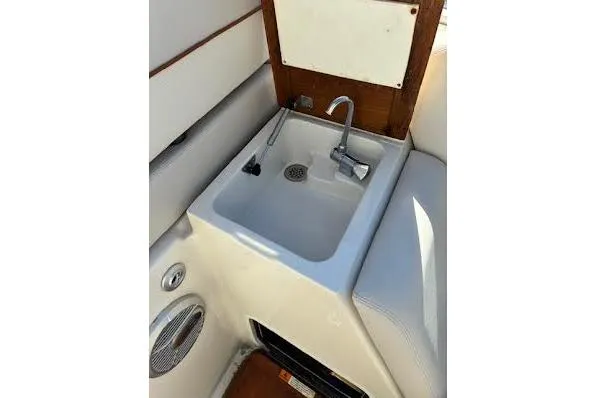 Andiamo Yacht Photos Pics 2006 Chris Craft Corsair Heritage boat sink with faucet and speaker.