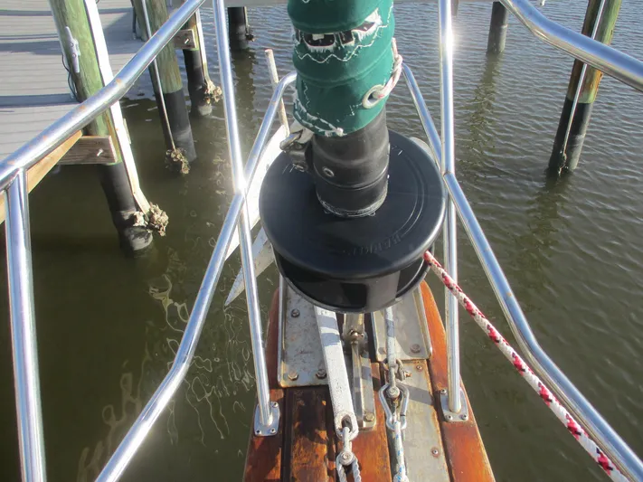  Yacht Photos Pics Bow of 1999 Island Packet 380 sailboat with anchor and railing.