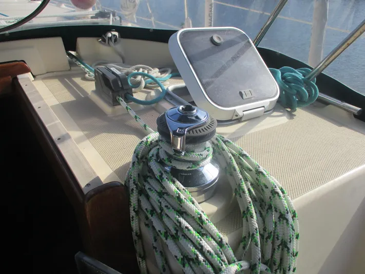  Yacht Photos Pics Sailboat deck of 1999 Island Packet 380 with winch and ropes.