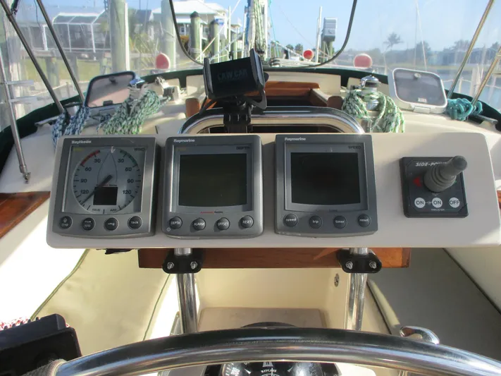  Yacht Photos Pics Cockpit of 1999 Island Packet 380 sailboat with navigation instruments and controls.