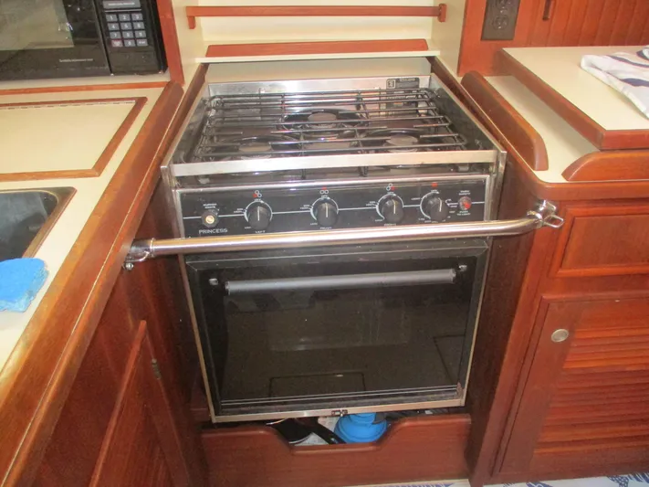  Yacht Photos Pics Stove and oven in 1999 Island Packet 380 yacht kitchen.