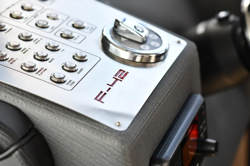 Falcon F-42 2x440 Hp Yanmar Yacht Photos Pics Control panel of 2025 Falcon Yachts F-42 with joystick and buttons.