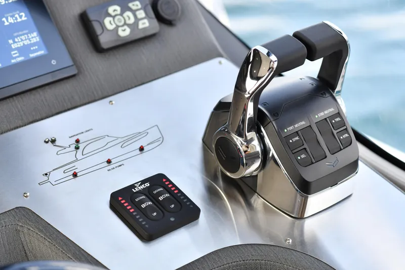 Falcon F-42 2x440 Hp Yanmar Yacht Photos Pics Control panel of 2025 Falcon Yachts F-42 with joystick and throttle levers.