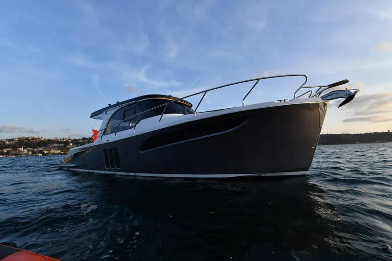 Falcon F-42 2x440 Hp Yanmar Yacht Photos Pics 2025 Falcon Yachts F-42 on water, featuring sleek design and joystick control.