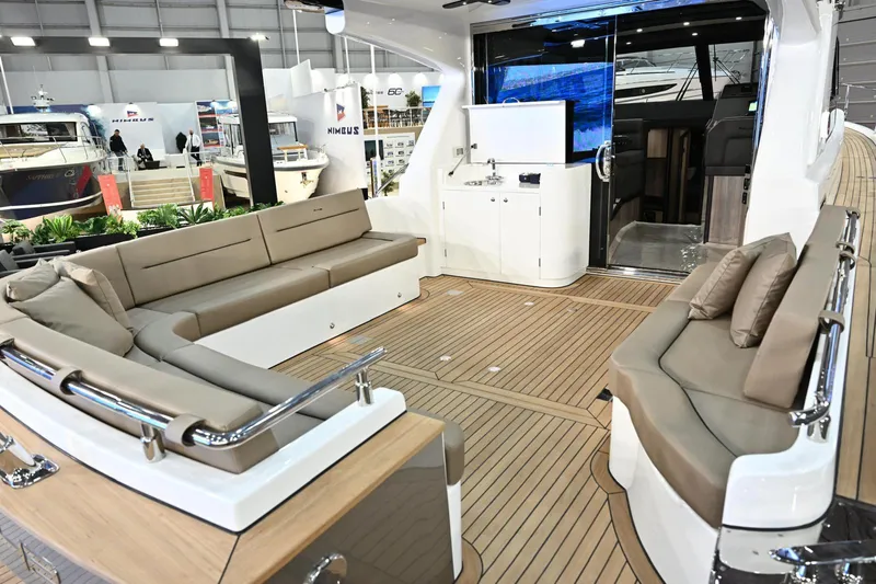 Falcon F-42 2x440 Hp Yanmar Yacht Photos Pics Luxurious 2025 Falcon Yachts F-42 interior with spacious seating and modern amenities.